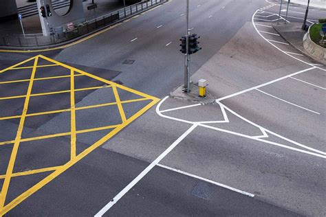 what is a box junction on the road|stopping in yellow cross hatching.